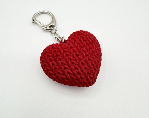 3D printed red heart keychain with a realistic knitted texture and silver swivel lobster clasp.