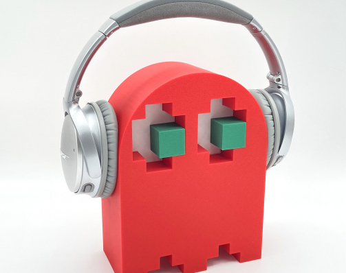 Green eyes and red body ghost shaped headphone stand