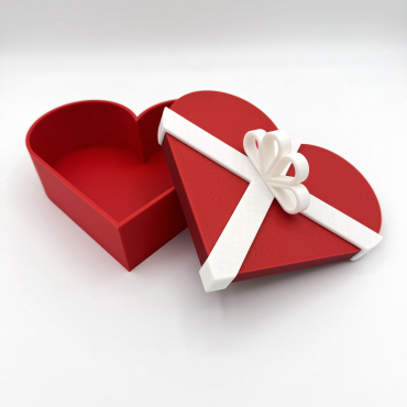 3D printed red heart-shaped gift box with white ribbon, customizable colors