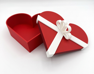 3D printed red heart-shaped gift box with white ribbon, customizable colors