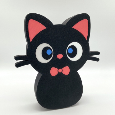 Front-facing view of a standing cute black cat box with a pink bow tie and big blue eyes.